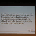 Una delle slide della conferenza